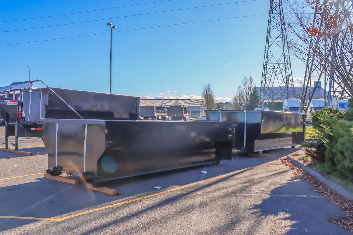 Roll-off dumpster ready for waste disposal at job site for 2 Yard Dumpster Rental in South Burlington